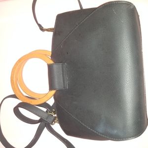 Falls Creek black everyday bag with Wood circle handle detail and strap